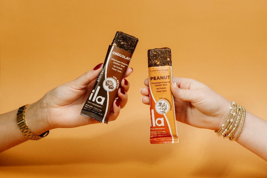 ILA Chocolate and ILA Peanut include 9g of plant-based protein and are made with adaptogens like Ashwagandha and Reishi. ILA Chocolate and ILA Peanut include 9g of plant-based protein and are made with adaptogens like Ashwagandha and Reishi.